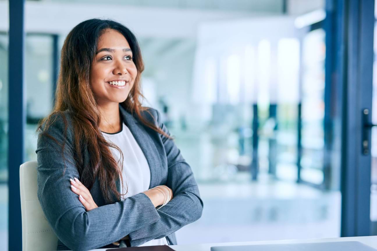 Workplace apprenticeship training discussion Professionals discussing apprenticeship training in a modern workplace