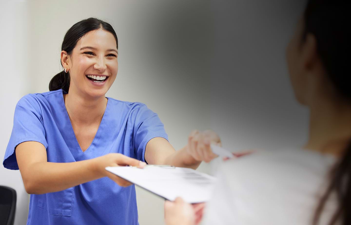 Healthcare team working together in a medical environment supporting patient administration